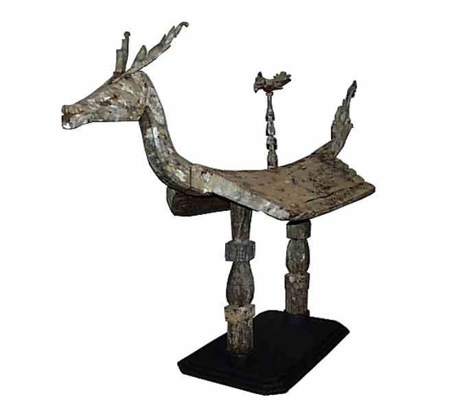 5: Wood Shrine in the form of a Deer with Sacred Hornbill on Perch